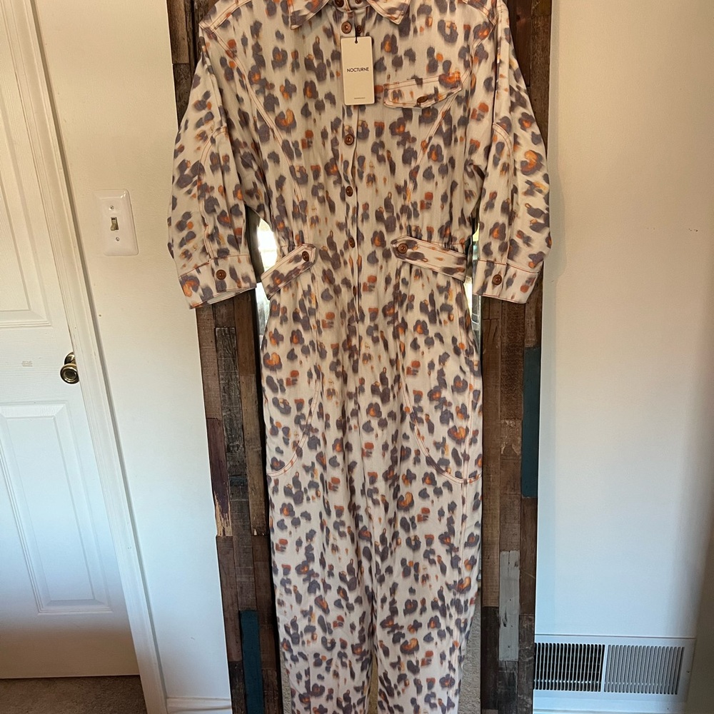 NOCTURNE JUMP SUIT SIZE LARGE